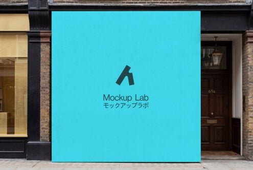 Bright turquoise storefront mural with dark Mockup Lab logo centered
