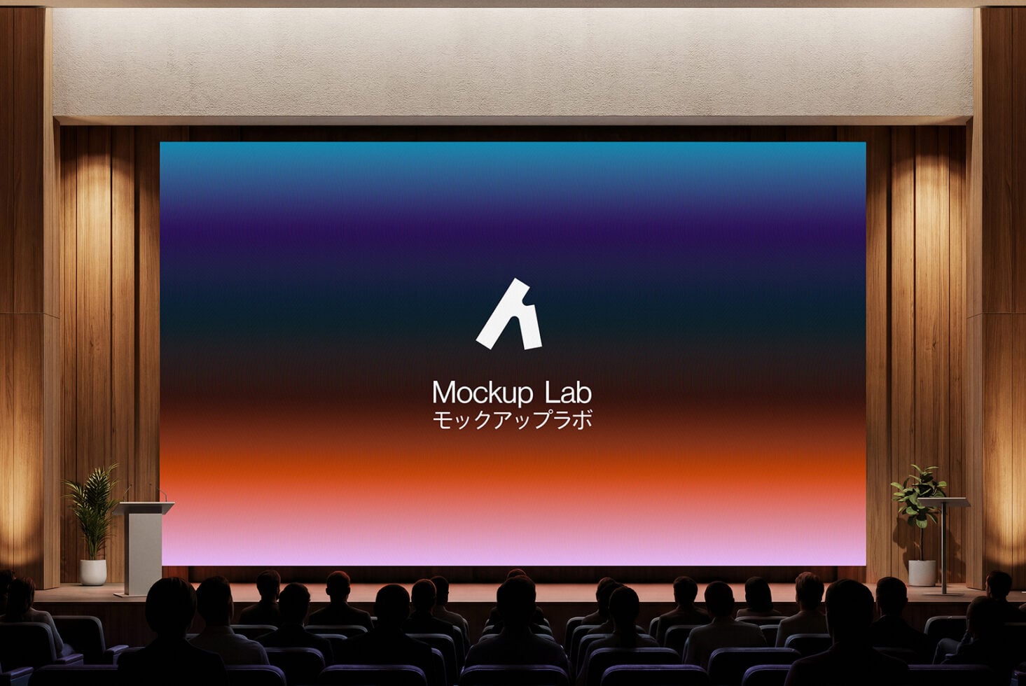 Theater screen with gradient backdrop behind Mockup Lab logo, audience below
