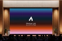 Theater screen with gradient backdrop behind Mockup Lab logo, audience below