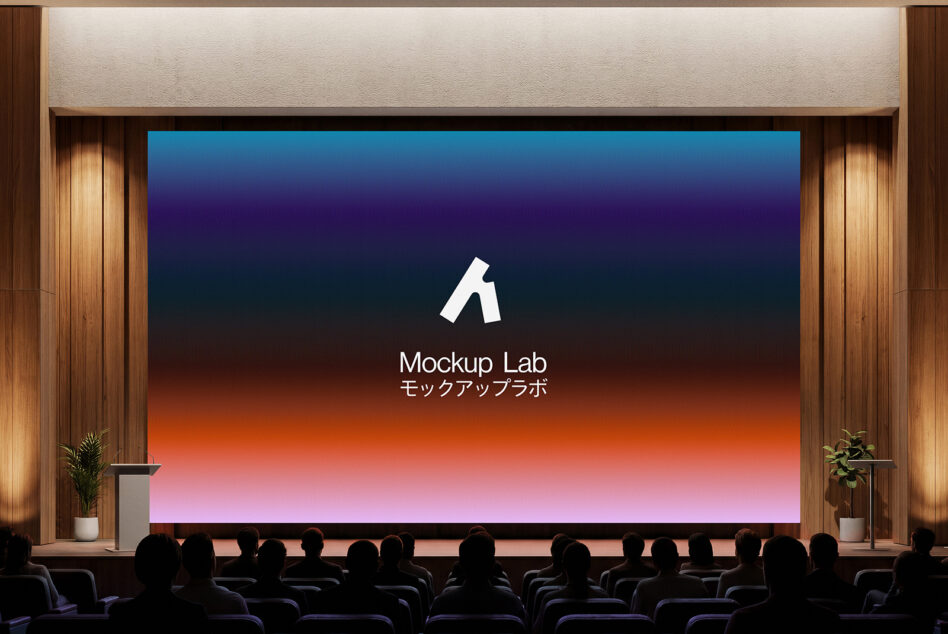 Theater screen with gradient backdrop behind Mockup Lab logo, audience below