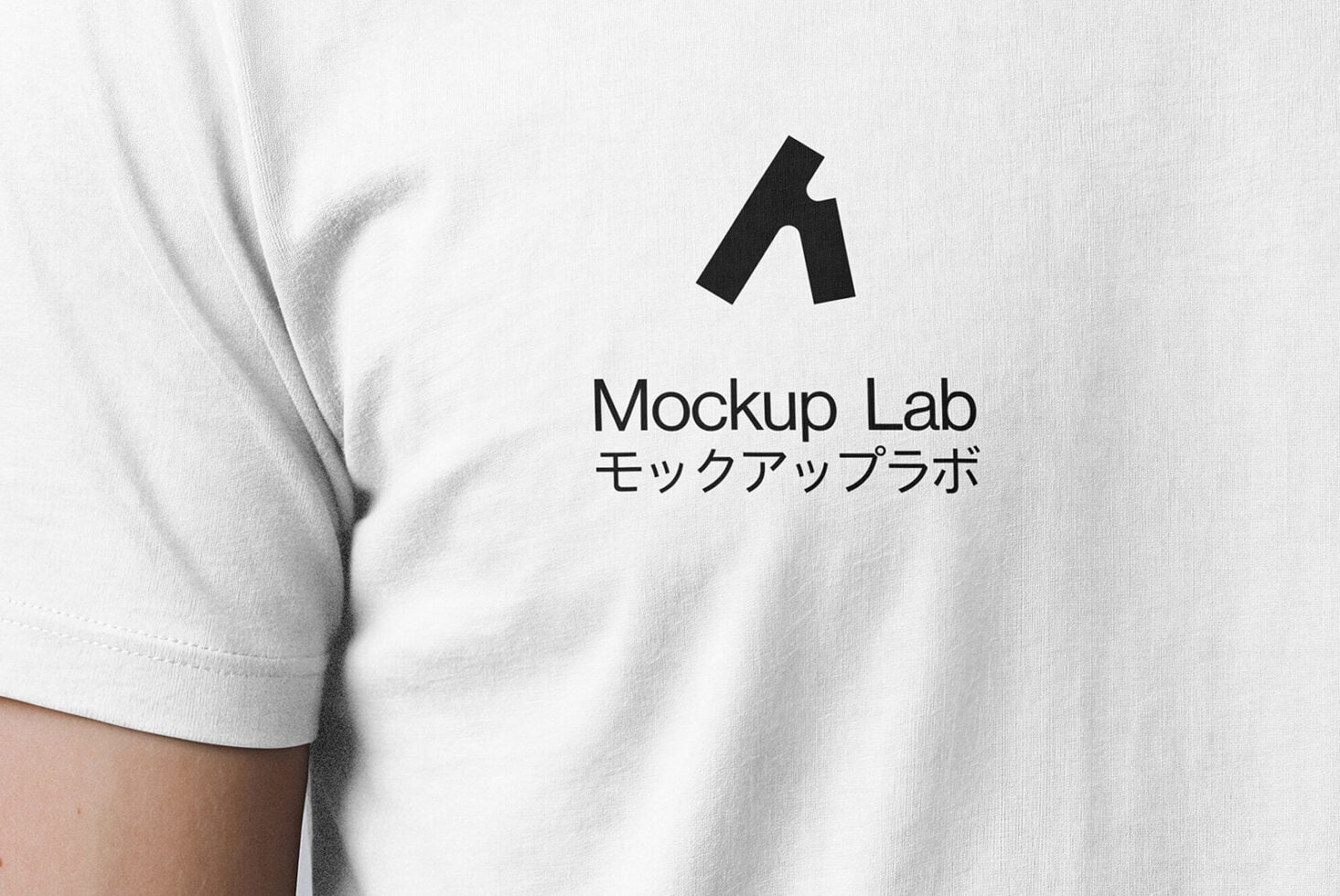 White t-shirt mockup with black logo centered on chest