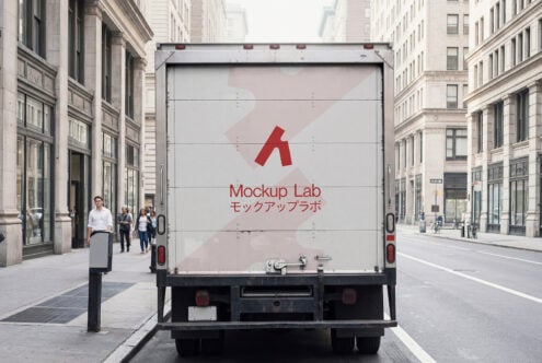Truck cargo door mockup with clean white surface on city street