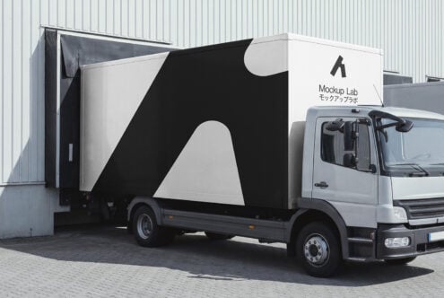 Delivery truck with black curved graphic design plus Mockup Lab logo on white side panel