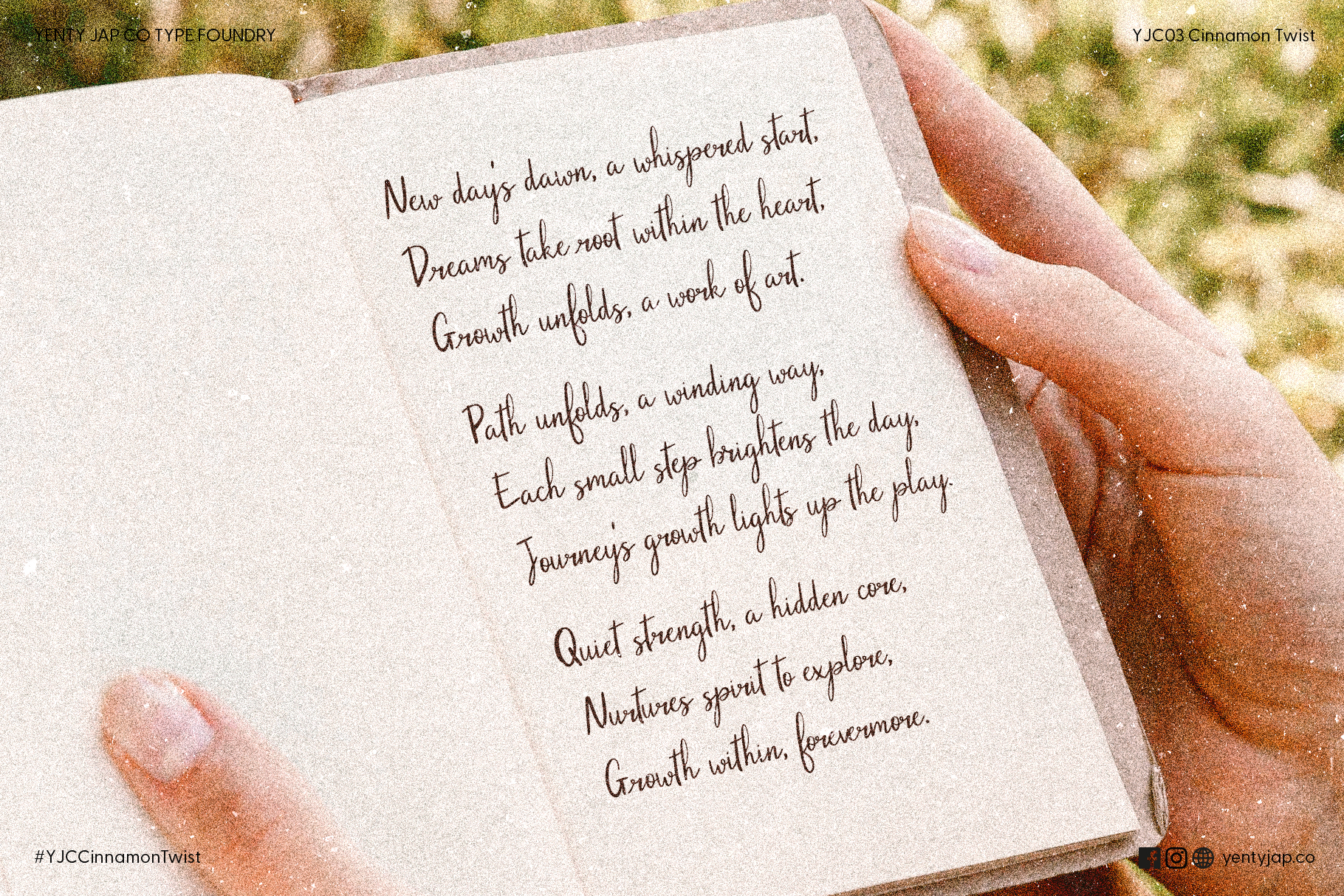 Hands holding journal page with Cinnamon Twist cursive writing outdoors in sunlight