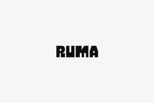 Puma logo in bold black type centered on light gray background