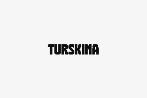 Turskina typeface in black on light neutral background