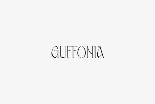 Guffonia thin outline font in all caps on neutral background