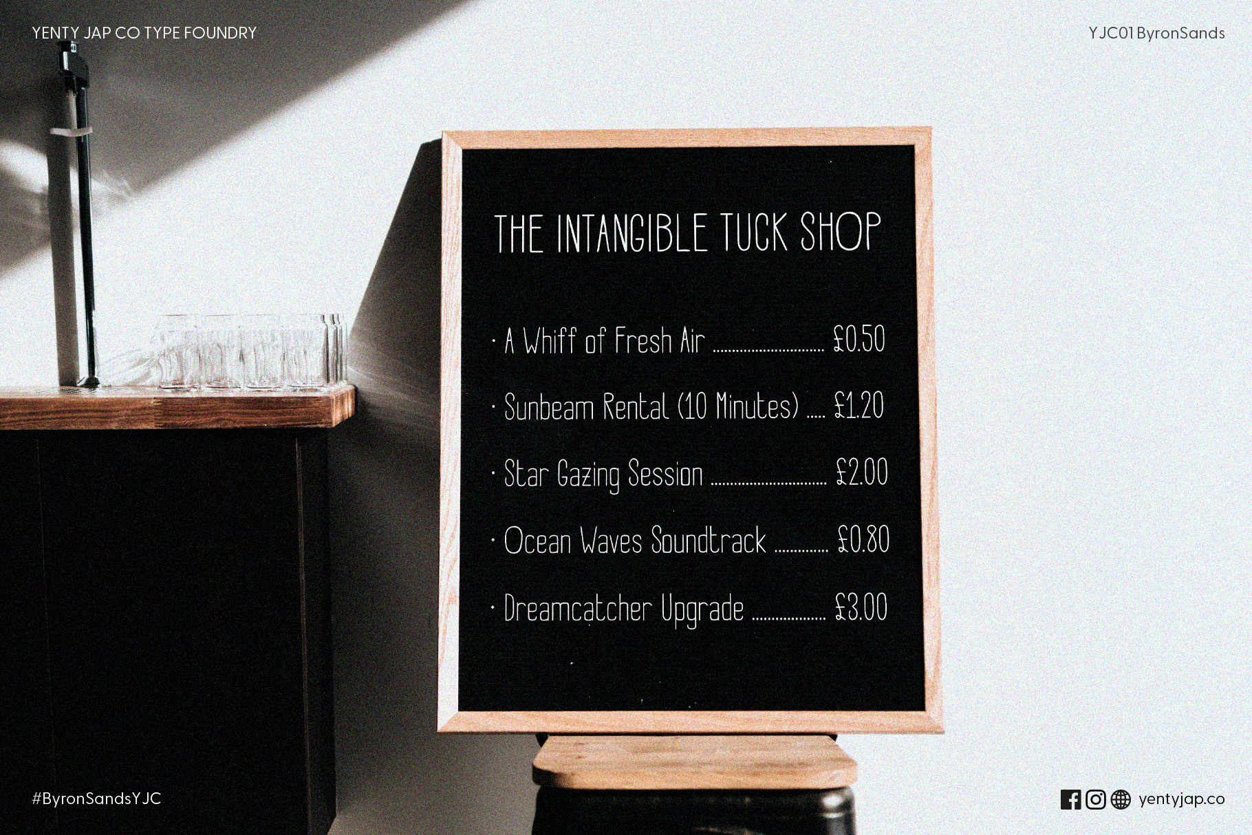 Wooden menu board displaying funny menu items in Byron Sands font