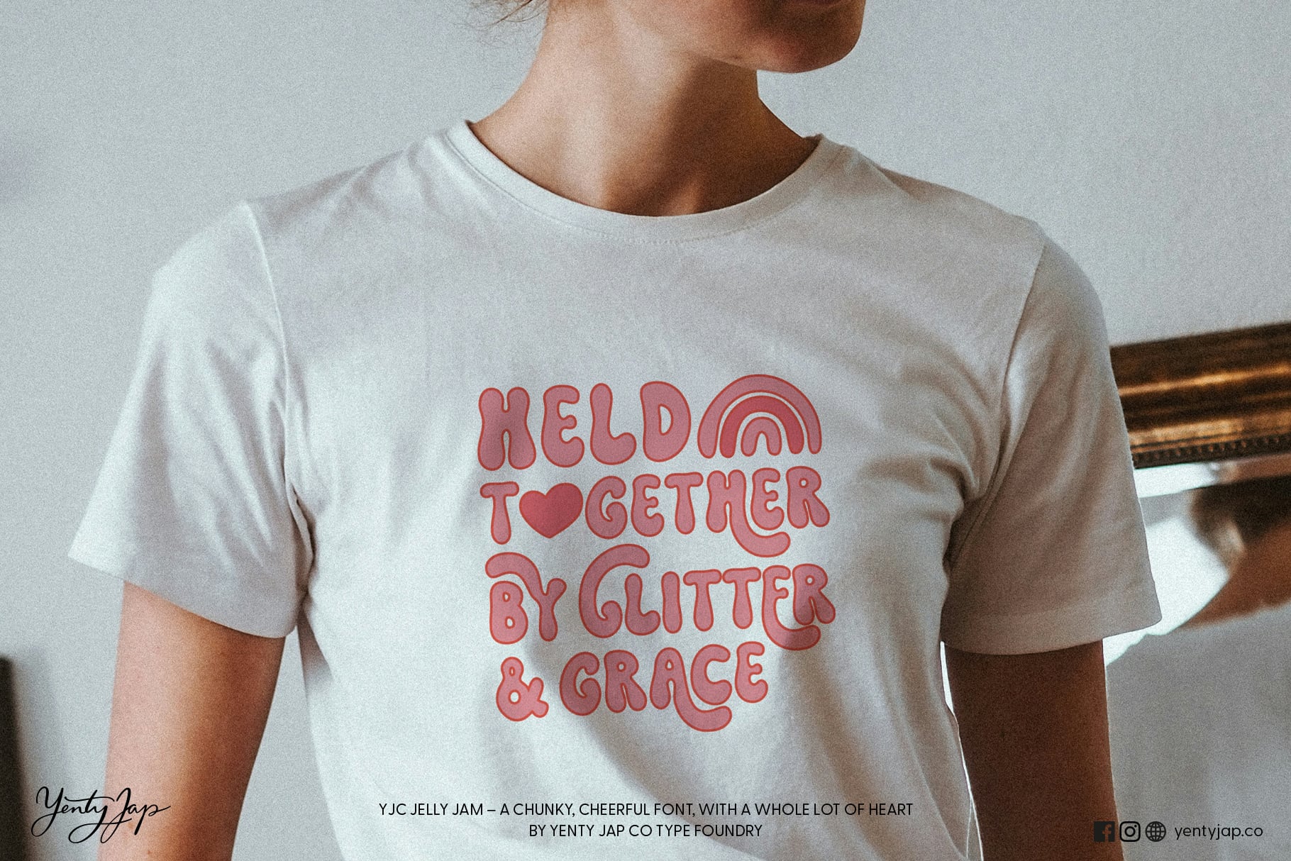 Held Together By Glitter Grace printed in pink on cream t-shirt