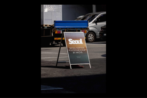 Outdoor A-frame poster mockup featuring Seoul edition design. Ideal for showcasing artwork in urban settings. Perfect for graphic design templates.