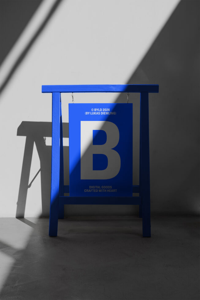 Blue wooden frame with white card featuring large blue B in center