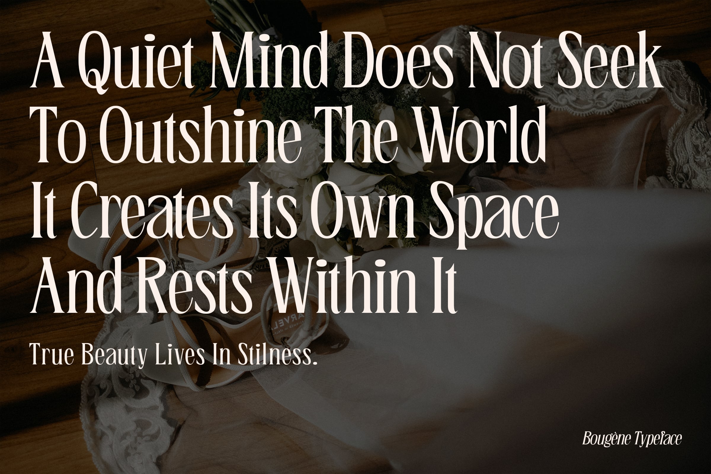 Quote about quiet minds displayed in serif font over floral background