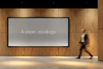 Ultrawide digital signage on wooden panels with grey background