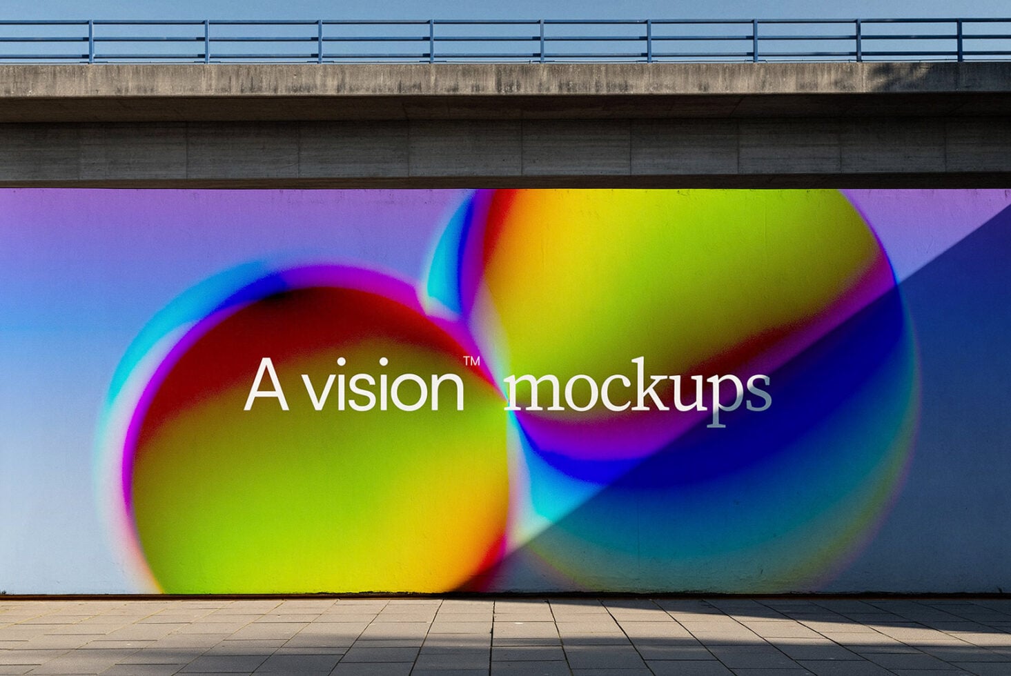 Colorful gradient spheres with rainbow halos on concrete wall under bridge
