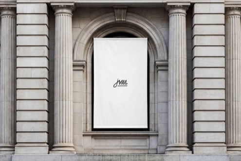 White poster mockup on neoclassical architecture with ornate columns