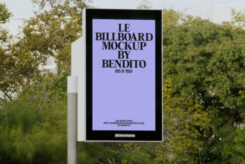 Public signage with lavender background on pole surrounded by green foliage