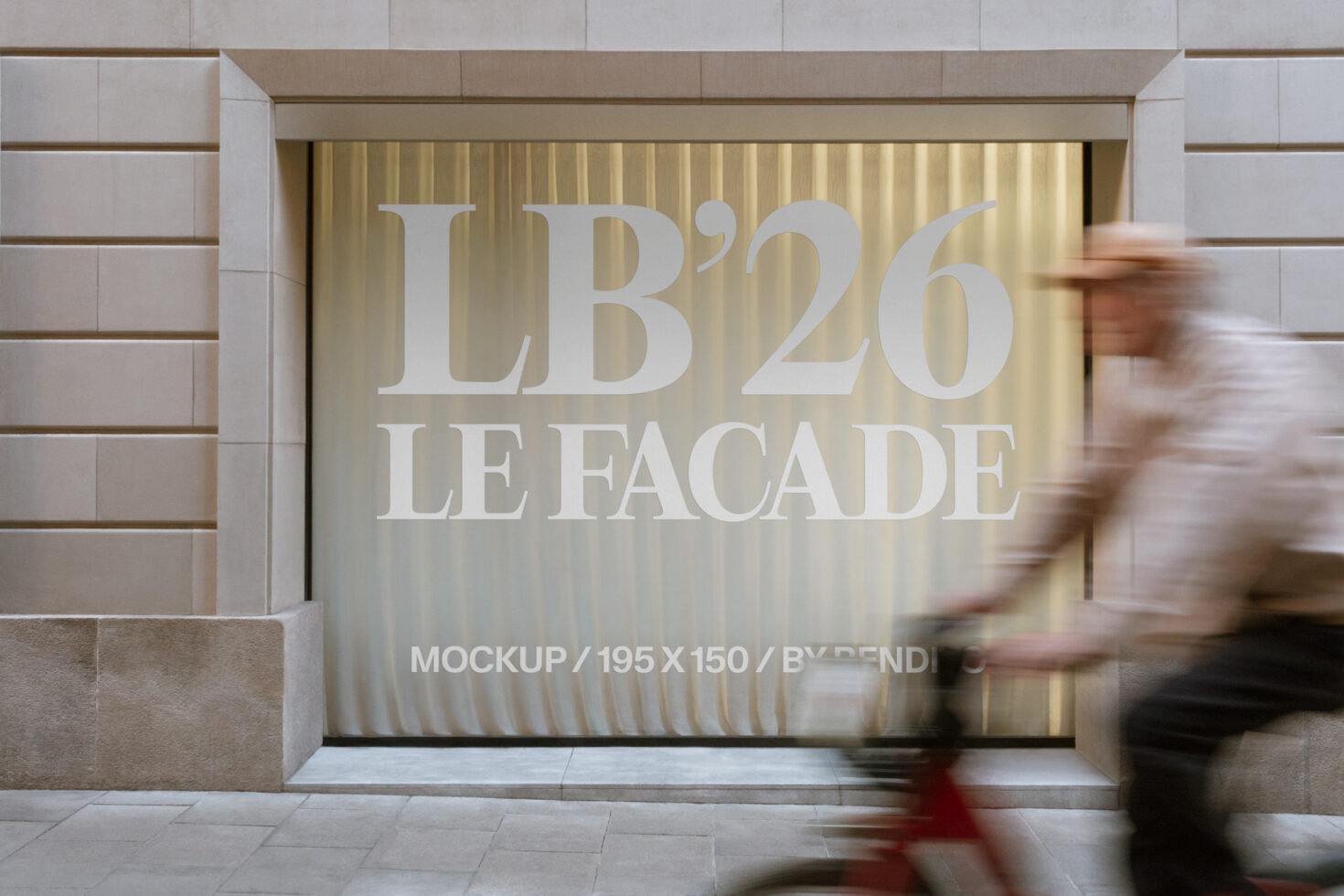 Storefront window display with cream text reading LB'26 LE FACADE on golden rippled backdrop