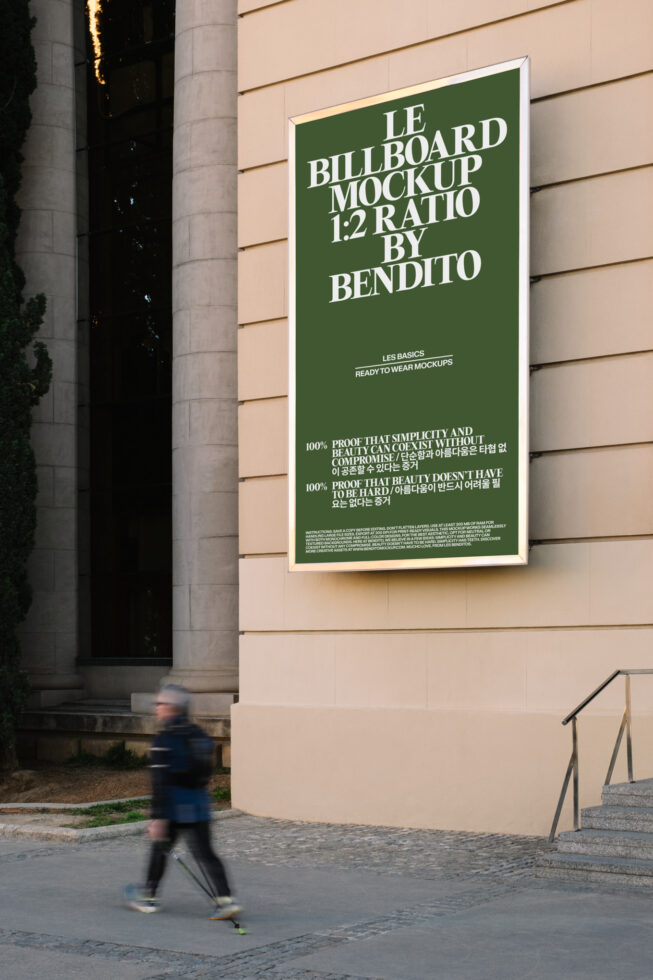 Building mounted billboard mockup with green background, white frame, daylight setting