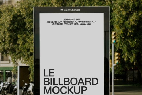 Street billboard mockup with black frame showing white layout on neutral background