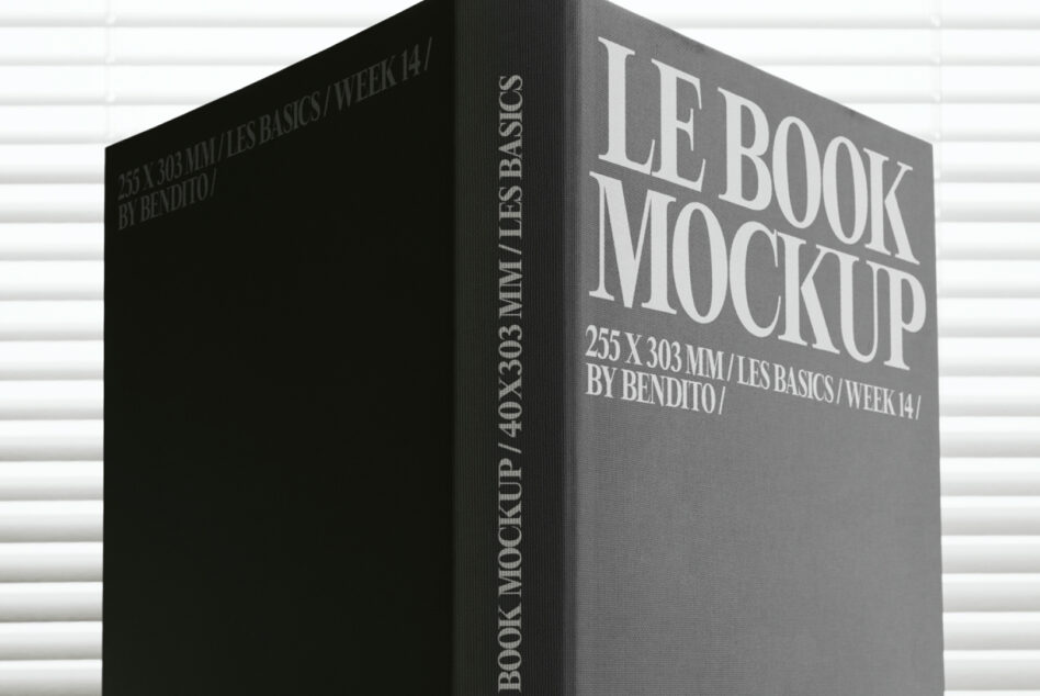 Gray hardback book mockup with white lettering on dark textured background