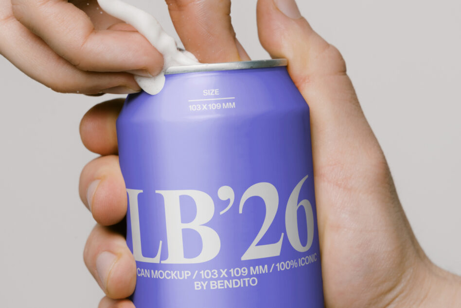Bright blue soda can labeled LB'26 being opened by hands against white background