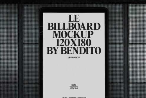 White display screen mockup mounted on dark perforated metal wall