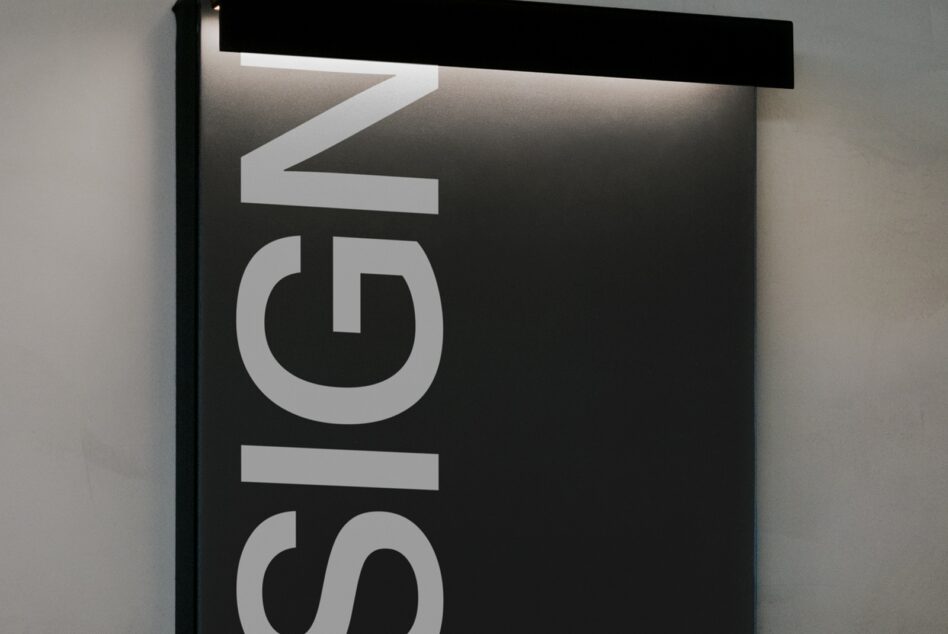 Wide white neon sign mockup with Le Siglo text glowing against dark interior space