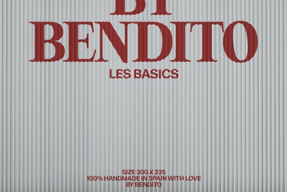 Red textured serif type saying Di Bendito Les Basics on corrugated metal backdrop