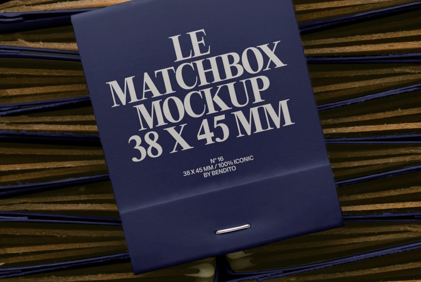 Navy matchbox on striped wood background with cream serif typography