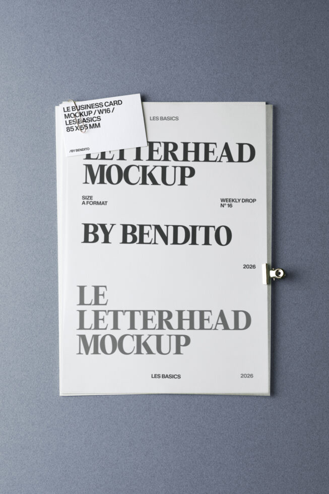 Letterhead mockup with business card on blue-gray backdrop showing serif typography