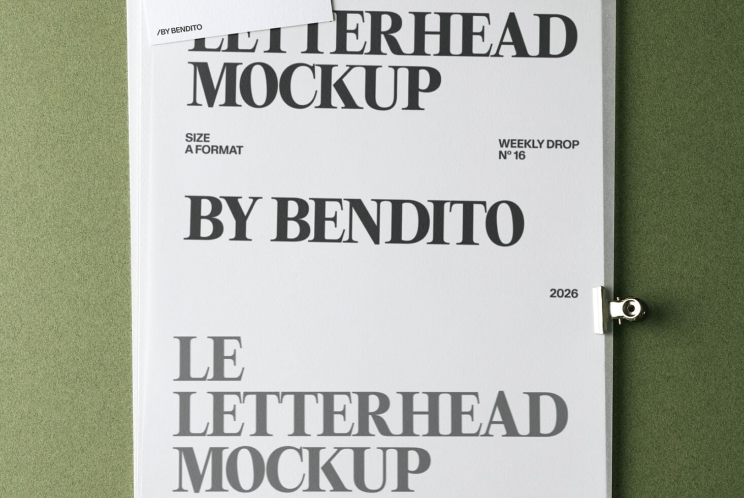 Letterhead mockup on green background showing serif font design with clip