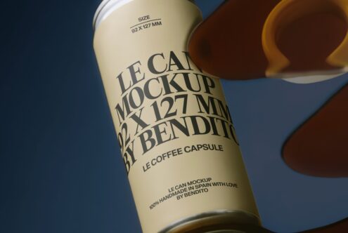 Cream coffee capsule can mockup on blue background showing full label with size specs
