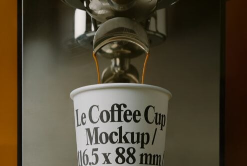 Coffee pouring into white cup with Le Coffee Cup Mockup text, overhead shot