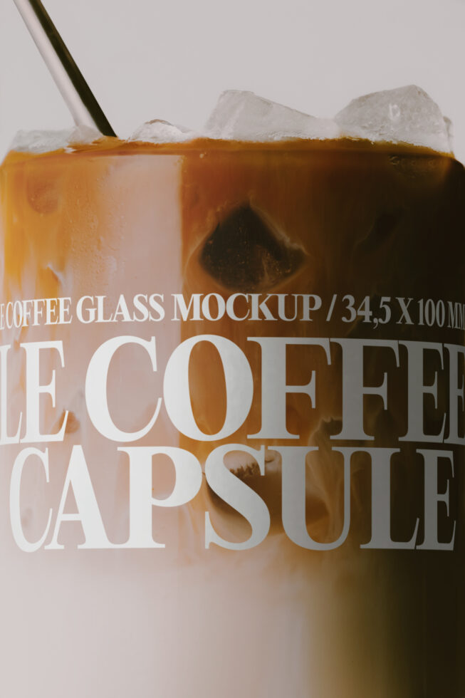 Iced coffee glass mockup with white text overlay on white background, straw detail