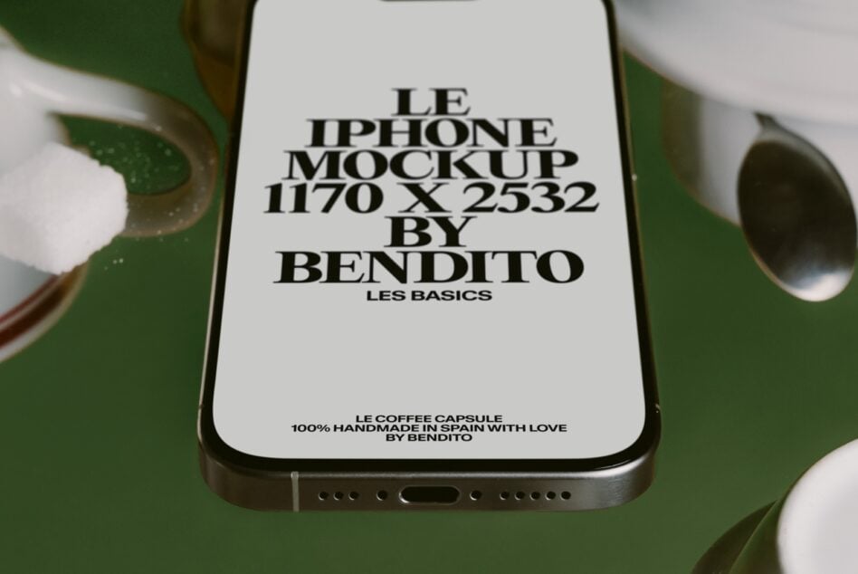 iPhone mockup on green background showing white screen with black text, ceramic cups