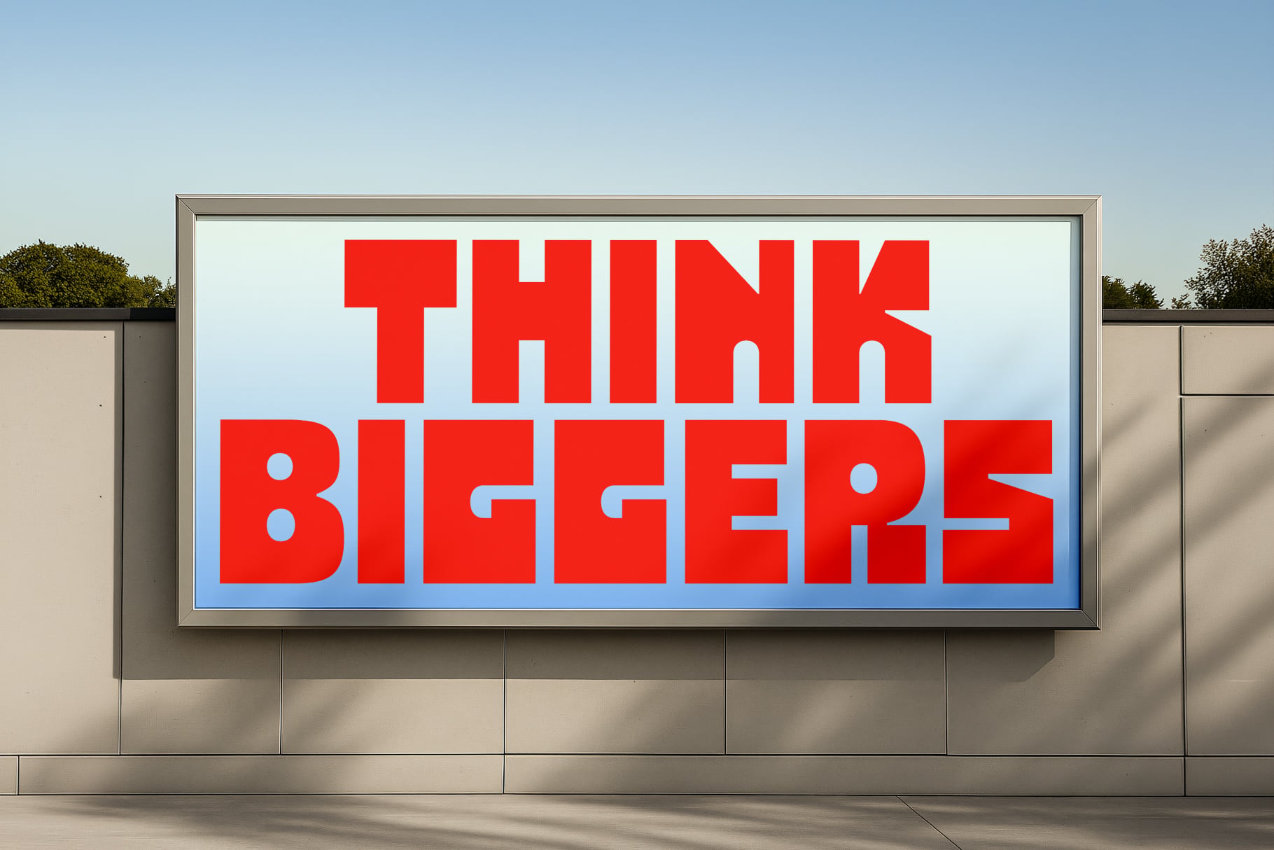 Indoor billboard mockup with Think Bigger text in red on blue gradient background
