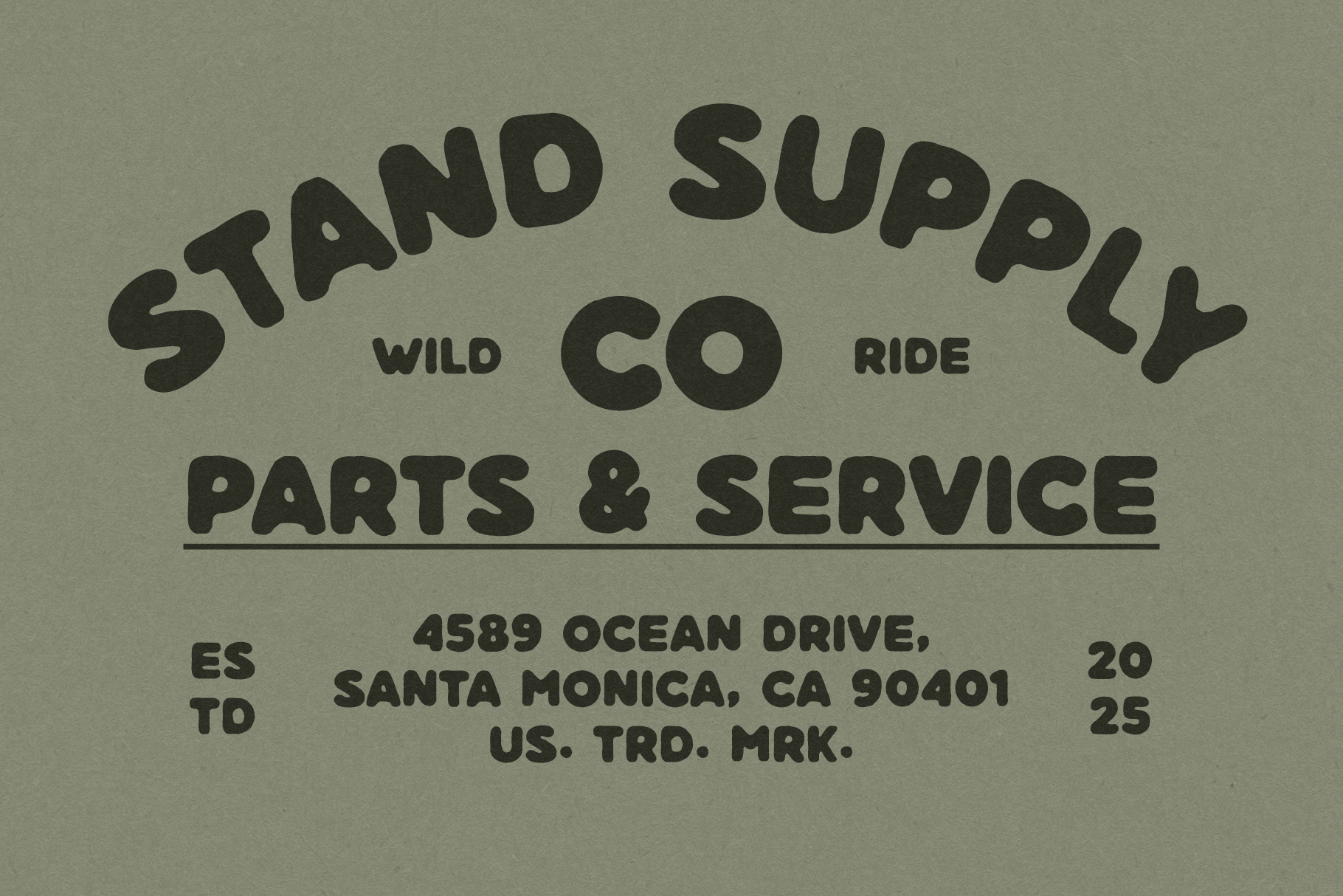 Vintage motorcycle shop sign, cream type on sage green background