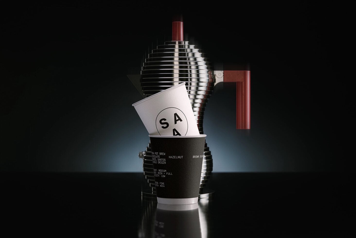 Coffee cup mockup with brand logo, chrome equipment, burgundy accent pieces visible