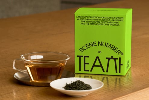 Bright lime green tea box with black typography next to brewed cup, loose leaves in small bowl