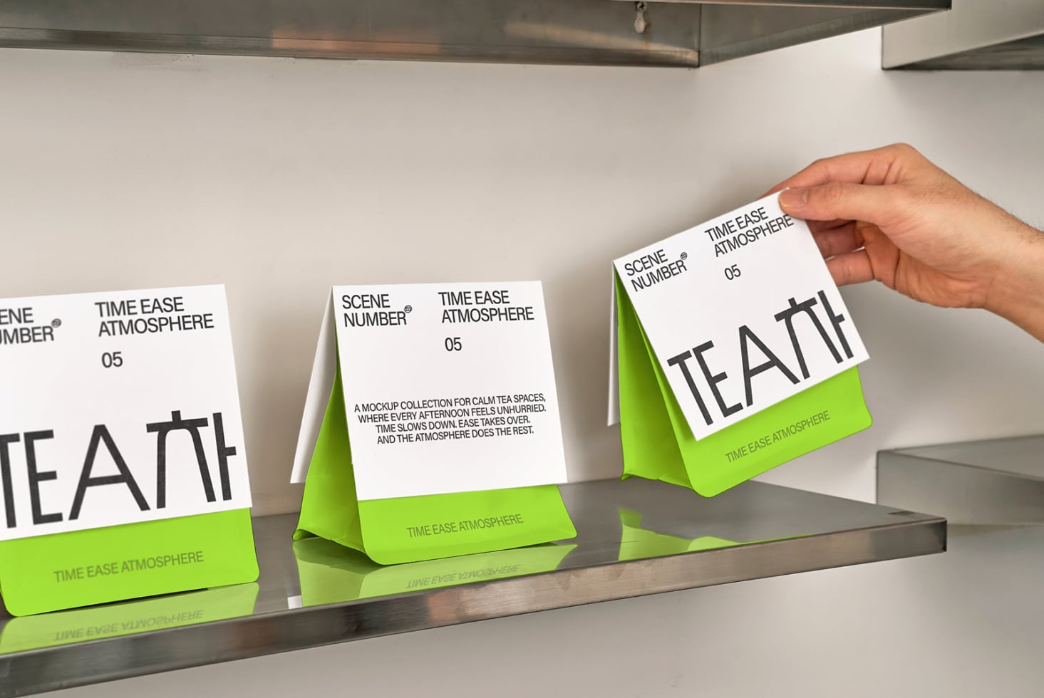 Tea box mockup with flipped white top panel showing lime green interior side