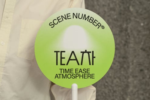 Lime green round scene clapper with white glow center area