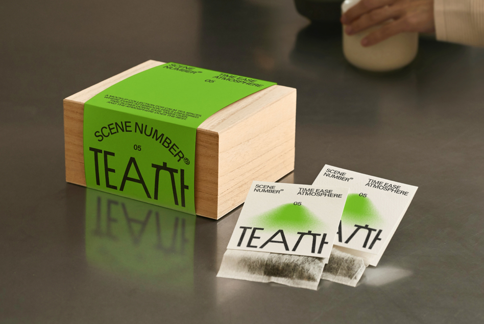 Wood tea box with fully editable green paper sleeve plus matching bag wrappers