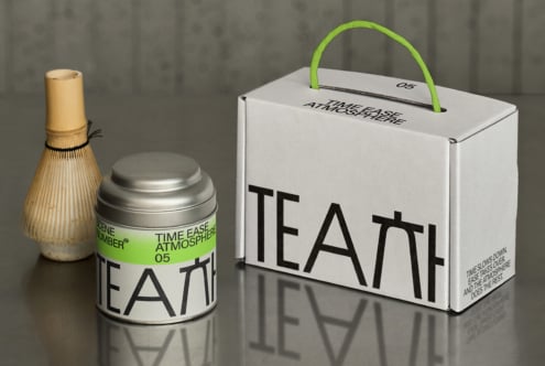 White tea box with bright green handle, editable design, metal canister shown