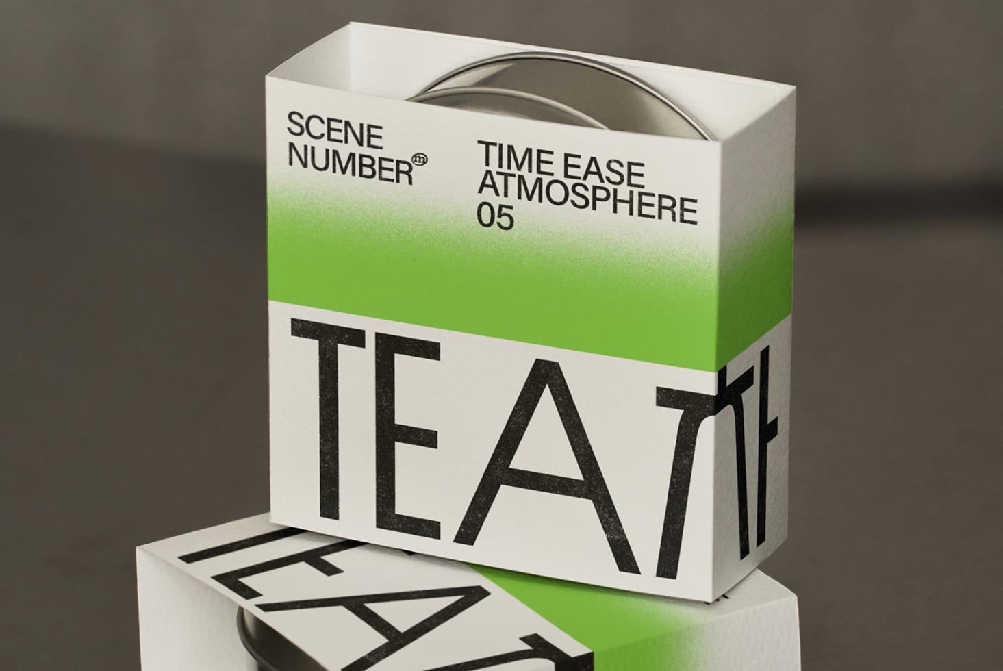 White tea box with green gradient stripe, matching product lid visible