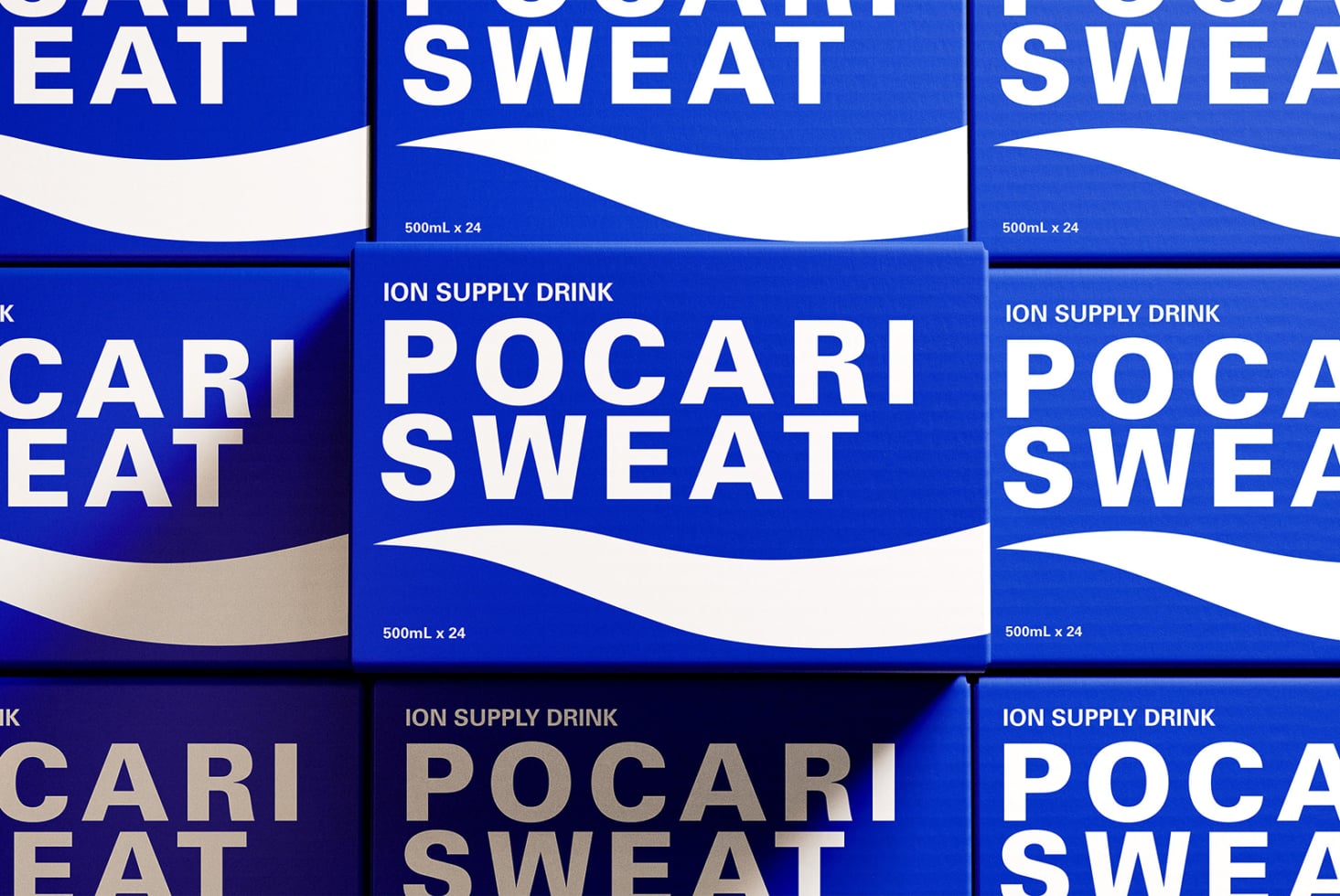 Pocari Sweat drink cans stacked showing blue label with white wave design detail