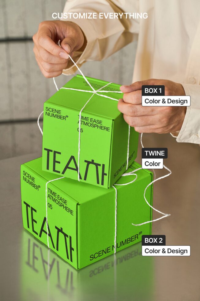 Customizable stacked tea boxes showing editable colors on twine string