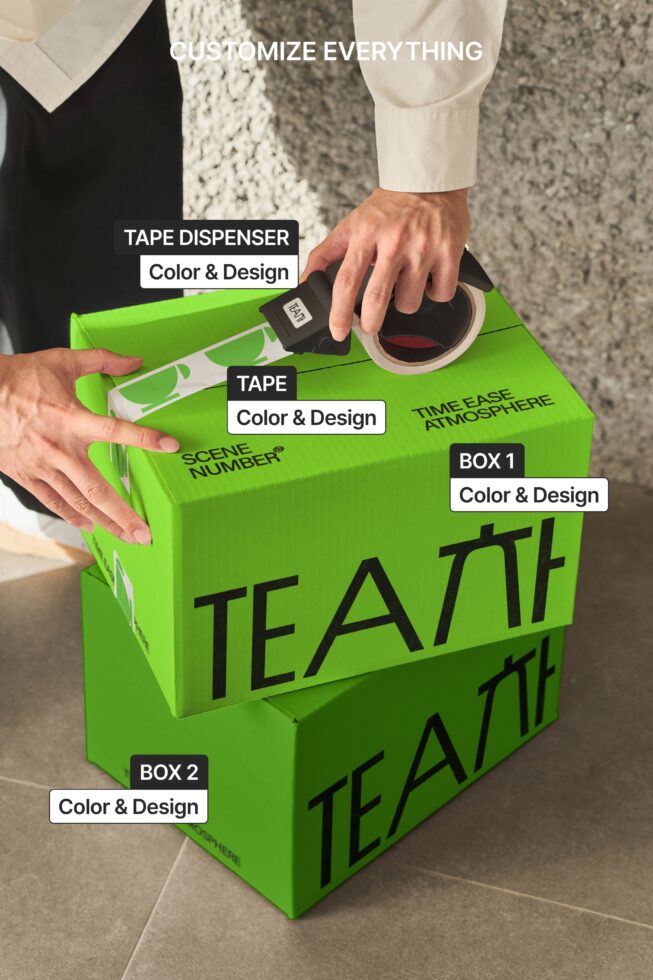 Overhead shot of tape dispenser, tape, two boxes with labeled parts