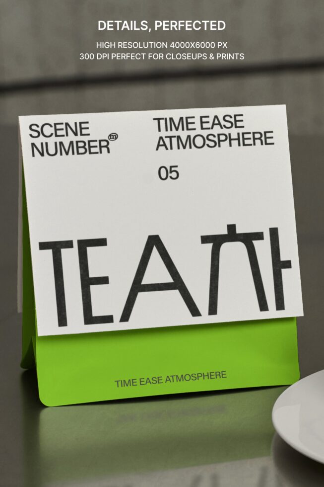 Close-up of folded paper sleeve mockup with lime green band displaying TEAM text