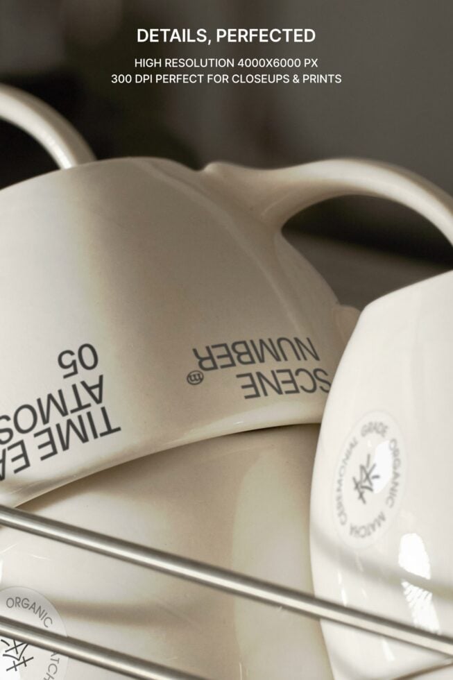 Close-up of white ceramic mug with reversed text printed on curved surface