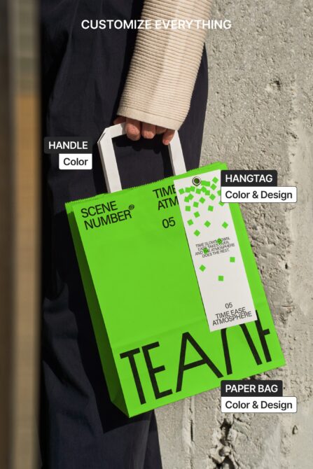 Paper bag mockup showing customizable handle color, tag design, bag color labeled